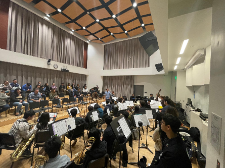 Picture of clinicians working with students at the tune-up festival